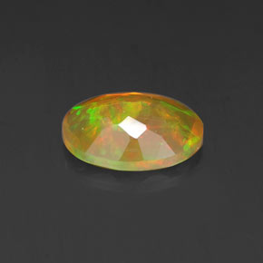 0.69캐럿 천연 멀티컬러 오팔, 타원형 컷, 8.1×6 mm, 투명한