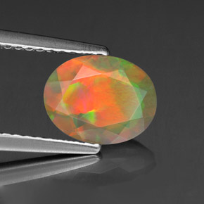 1.11캐럿 천연 멀티컬러 오팔, 타원형 컷, 9×7.1 mm, 투명한