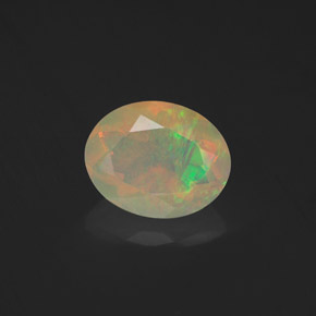 1.23캐럿 천연 멀티컬러 오팔, 타원형 컷, 9×7.2 mm, 투명한