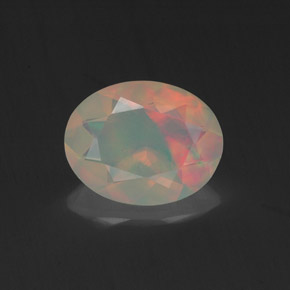 0.96캐럿 천연 멀티컬러 오팔, 타원형 컷, 9×7.1 mm, 투명한