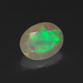 1.06캐럿 천연 멀티컬러 오팔, 타원형 컷, 9×7.1 mm, 투명한