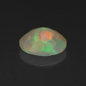 1.06캐럿 천연 멀티컬러 오팔, 타원형 컷, 9×7.1 mm, 투명한