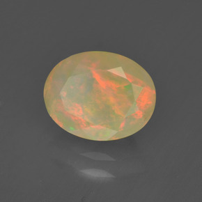 1.19캐럿 천연 멀티컬러 오팔, 타원형 컷, 9×7.1 mm, 투명한