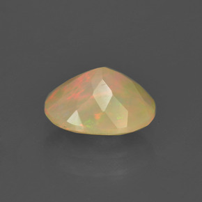 1.19캐럿 천연 멀티컬러 오팔, 타원형 컷, 9×7.1 mm, 투명한