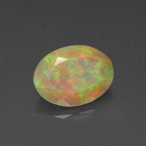 0.82캐럿 천연 멀티컬러 오팔, 투명한, 8.5×6.3 mm, 투명/반투명