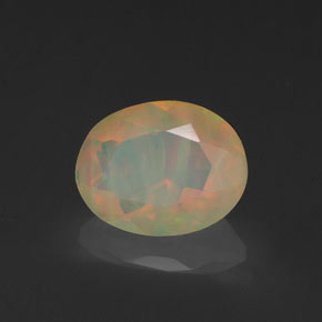 0.88캐럿 천연 멀티컬러 오팔, 투명한, 7.9×6.2 mm, 투명/반투명