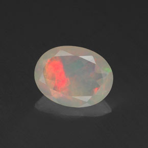 0.64캐럿 천연 멀티컬러 오팔, 타원형 컷, 8×6.1 mm, 투명한