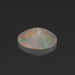 0.64캐럿 천연 멀티컬러 오팔, 타원형 컷, 8×6.1 mm, 투명한