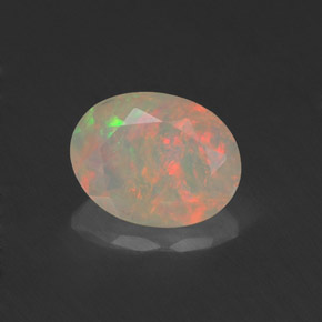 0.76캐럿 천연 멀티컬러 오팔, 투명한, 8.1×6.2 mm, 투명/반투명