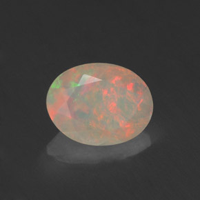 0.76캐럿 천연 멀티컬러 오팔, 투명한, 8.1×6.2 mm, 투명/반투명