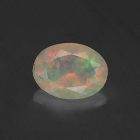 0.74캐럿 천연 멀티컬러 오팔, 타원형 컷, 8×6 mm, 투명한