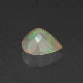 0.67캐럿 천연 멀티컬러 오팔, 배 모양, 7.2×7.1 mm, 투명한