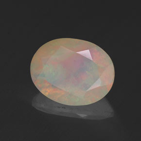 1.13캐럿 천연 멀티컬러 오팔, 투명한, 9×7.1 mm, 투명/반투명