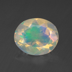 1.28캐럿 천연 멀티컬러 오팔, 타원형 컷, 9.2×7.7 mm, 투명한