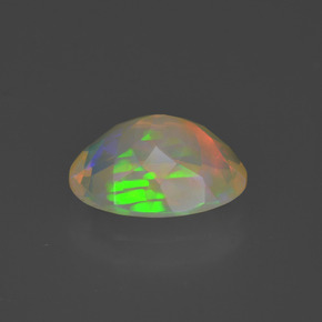 1.47캐럿 천연 멀티컬러 오팔, 타원형 컷, 10.2×8 mm, 투명한