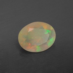 1.10캐럿 천연 멀티컬러 오팔, 투명한, 9×7.1 mm, 투명/반투명