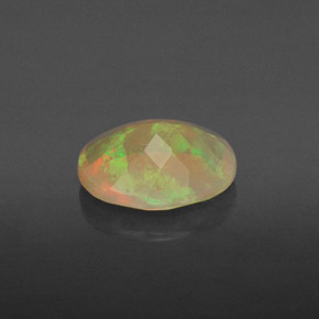 1.10캐럿 천연 멀티컬러 오팔, 투명한, 9×7.1 mm, 투명/반투명