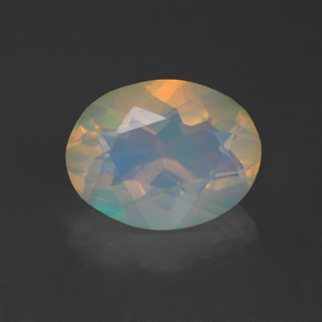 1.07캐럿 천연 멀티컬러 오팔, 타원형 컷, 9×7 mm, 투명한