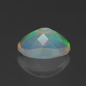 1.07캐럿 천연 멀티컬러 오팔, 타원형 컷, 9×7 mm, 투명한