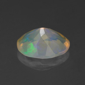 1.12캐럿 천연 멀티컬러 오팔, 타원형 컷, 9.3×7.2 mm, 투명한