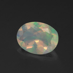 1.14캐럿 천연 멀티컬러 오팔, 타원형 컷, 9.5×7.2 mm, 투명한