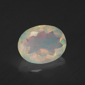 1.22캐럿 천연 멀티컬러 오팔, 타원형 컷, 9.3×7.3 mm, 투명한