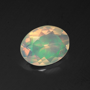 1.10캐럿 천연 멀티컬러 오팔, 타원형 컷, 9.3×7.2 mm, 투명한