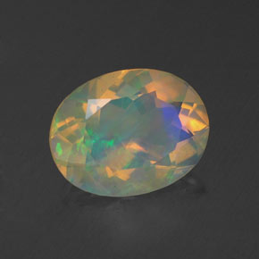 1.23캐럿 천연 멀티컬러 오팔, 타원형 컷, 9.1×7.1 mm, 투명한