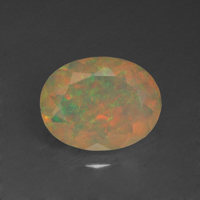 1.14캐럿 천연 멀티컬러 오팔, 타원형 컷, 9.2×7.1 mm, 투명한