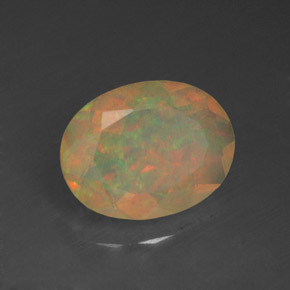 1.14캐럿 천연 멀티컬러 오팔, 타원형 컷, 9.2×7.1 mm, 투명한