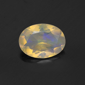 0.74캐럿 천연 멀티컬러 오팔, 타원형 컷, 8.3×6.2 mm, 투명한