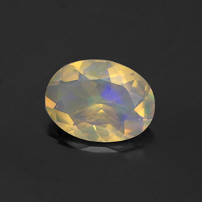 0.74캐럿 천연 멀티컬러 오팔, 타원형 컷, 8.3×6.2 mm, 투명한