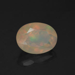 0.97캐럿 천연 멀티컬러 오팔, 타원형 컷, 8.2×6.2 mm, 투명한