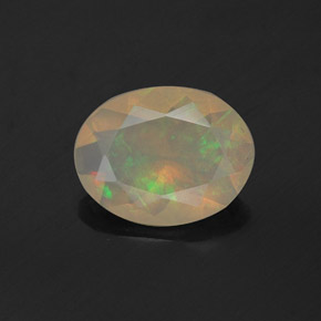 0.81캐럿 천연 멀티컬러 오팔, 타원형 컷, 9×7.1 mm, 투명한