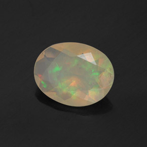 0.81캐럿 천연 멀티컬러 오팔, 타원형 컷, 9×7.1 mm, 투명한