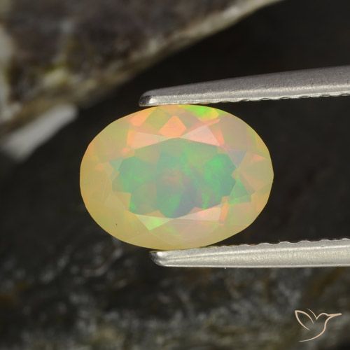 0.94캐럿 천연 멀티컬러 오팔, 타원형 컷, 8.2×6.2 mm, 투명한