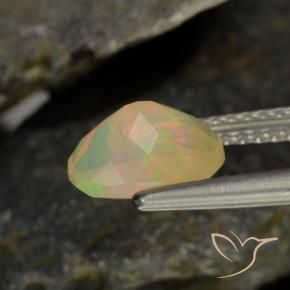 0.94캐럿 천연 멀티컬러 오팔, 타원형 컷, 8.2×6.2 mm, 투명한