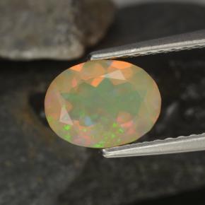 0.92캐럿 천연 멀티컬러 오팔, 타원형 컷, 8.2×6.3 mm, 투명한