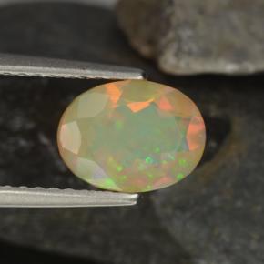 0.92캐럿 천연 멀티컬러 오팔, 타원형 컷, 8.2×6.3 mm, 투명한