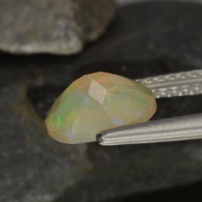 0.92캐럿 천연 멀티컬러 오팔, 타원형 컷, 8.2×6.3 mm, 투명한