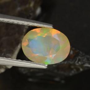 0.88캐럿 천연 멀티컬러 오팔, 타원형 컷, 8.3×6.2 mm, 투명한