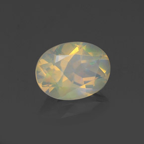 0.98캐럿 천연 멀티컬러 오팔, 타원형 컷, 8.2×6.2 mm, 투명한