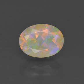 1.06캐럿 천연 멀티컬러 오팔, 타원형 컷, 8.3×6.2 mm, 투명한
