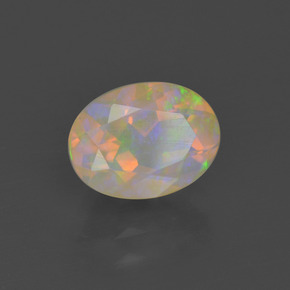 1.06캐럿 천연 멀티컬러 오팔, 타원형 컷, 8.3×6.2 mm, 투명한