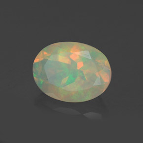 0.92캐럿 천연 멀티컬러 오팔, 타원형 컷, 8.2×6.2 mm, 투명한