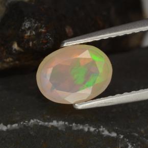 0.78캐럿 천연 멀티컬러 오팔, 타원형 컷, 8.2×6.2 mm, 투명한