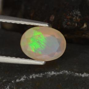0.78캐럿 천연 멀티컬러 오팔, 타원형 컷, 8.2×6.2 mm, 투명한