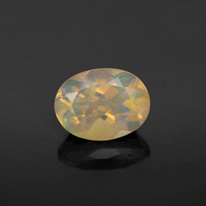 0.92캐럿 천연 멀티컬러 오팔, 타원형 컷, 8.1×6.1 mm, 투명한
