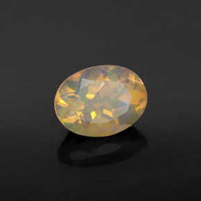 0.92캐럿 천연 멀티컬러 오팔, 타원형 컷, 8.1×6.1 mm, 투명한