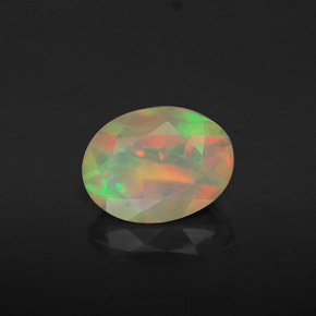 1.06캐럿 천연 멀티컬러 오팔, 타원형 컷, 8.6×6.5 mm, 투명한